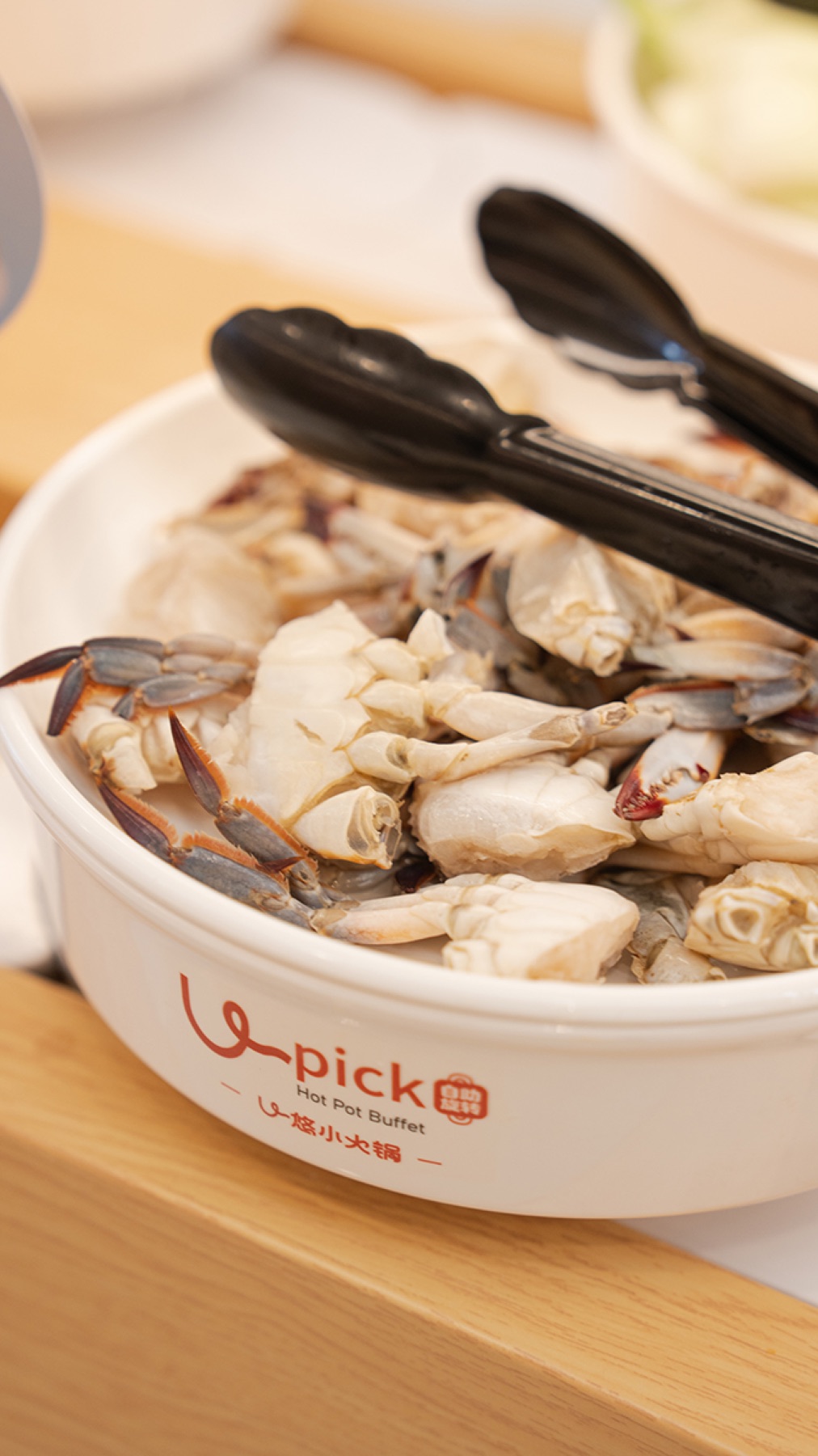 Crab pieces served in a U PICK ingredient bowl