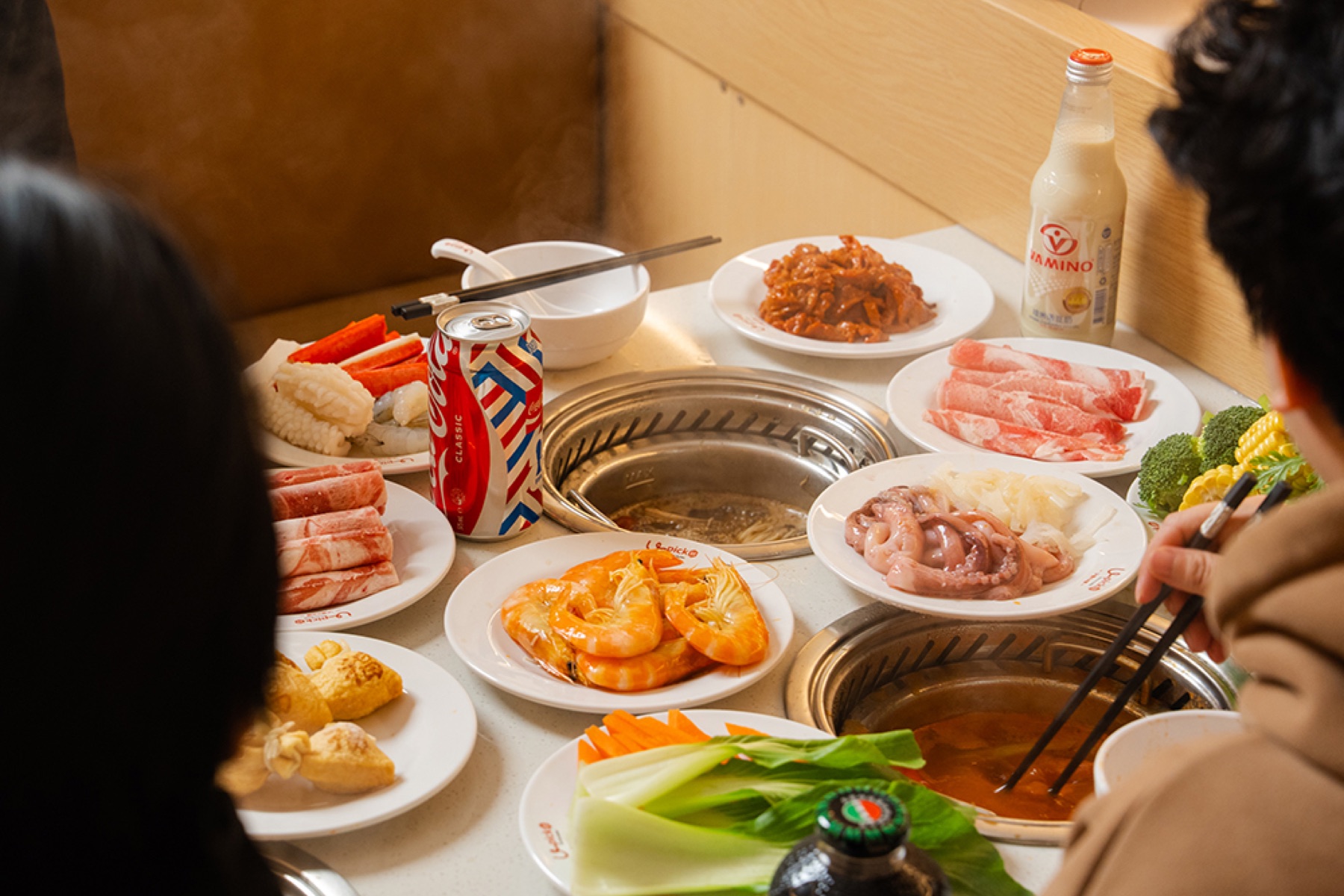 Friends sharing a hotpot meal at U PICK Hot Pot