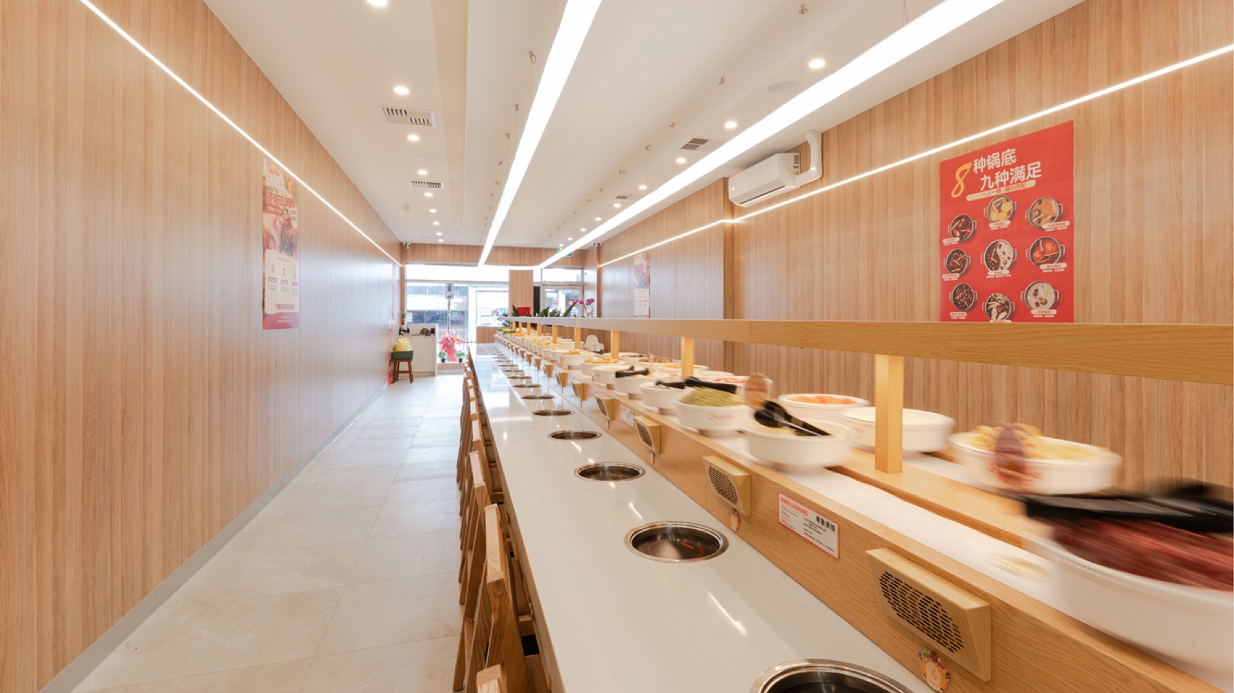 Fresh ingredients moving along the U PICK Hot Pot conveyor belt