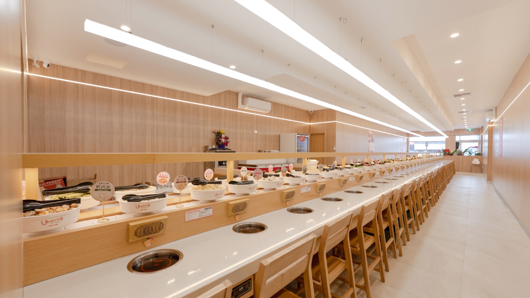Bright individual hotpot seating inside U PICK Clayton